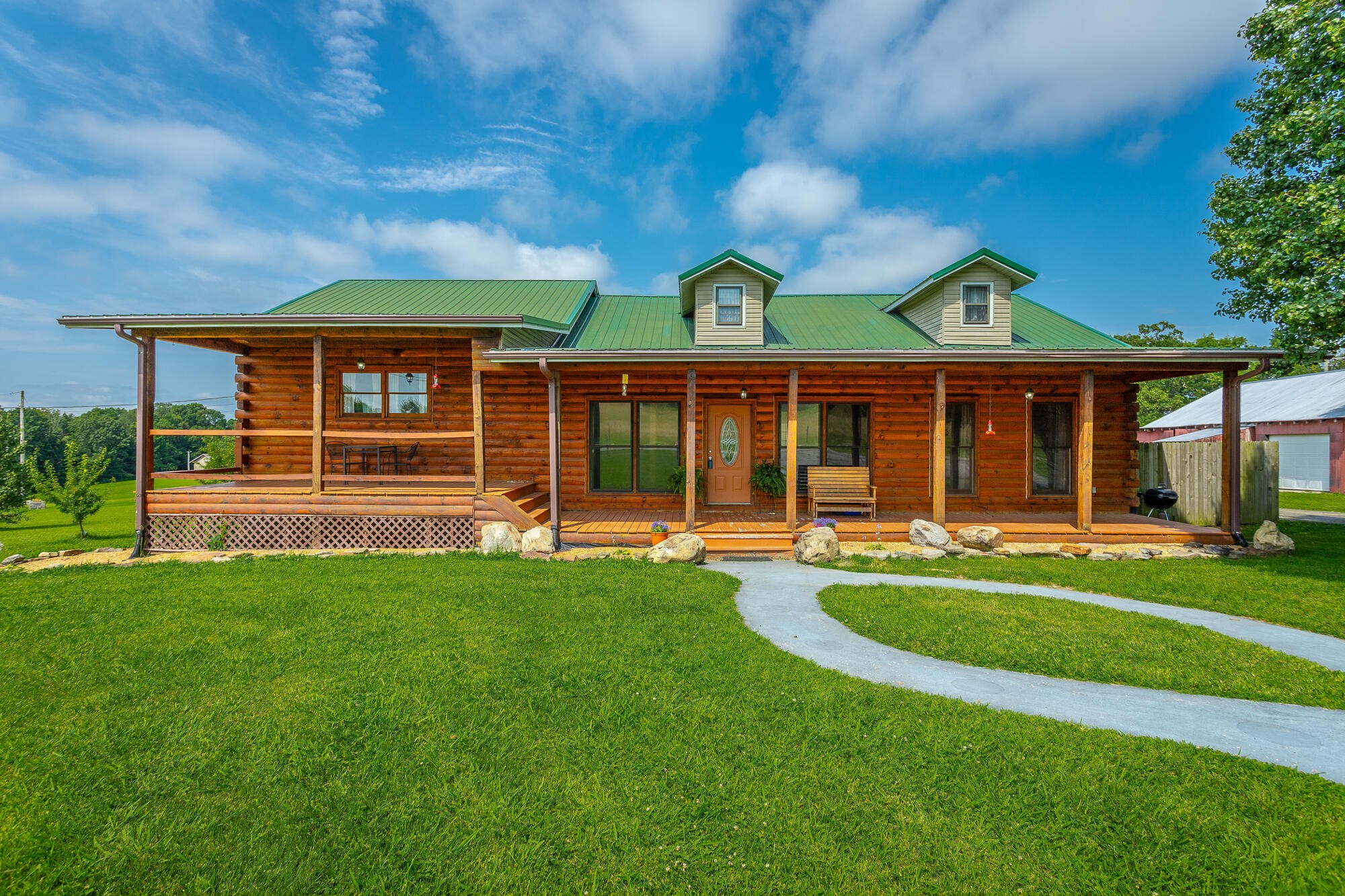 2195 Myers Road Pikeville, TN 37367 - Photo 3 of 100 a front view of a house with a yard