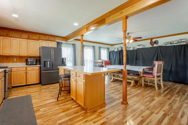 a bathroom with a sink vanity and mirror