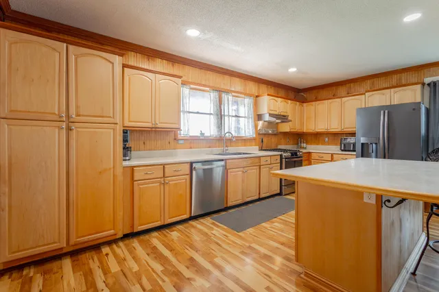 a view of a livingroom with furniture and furniture