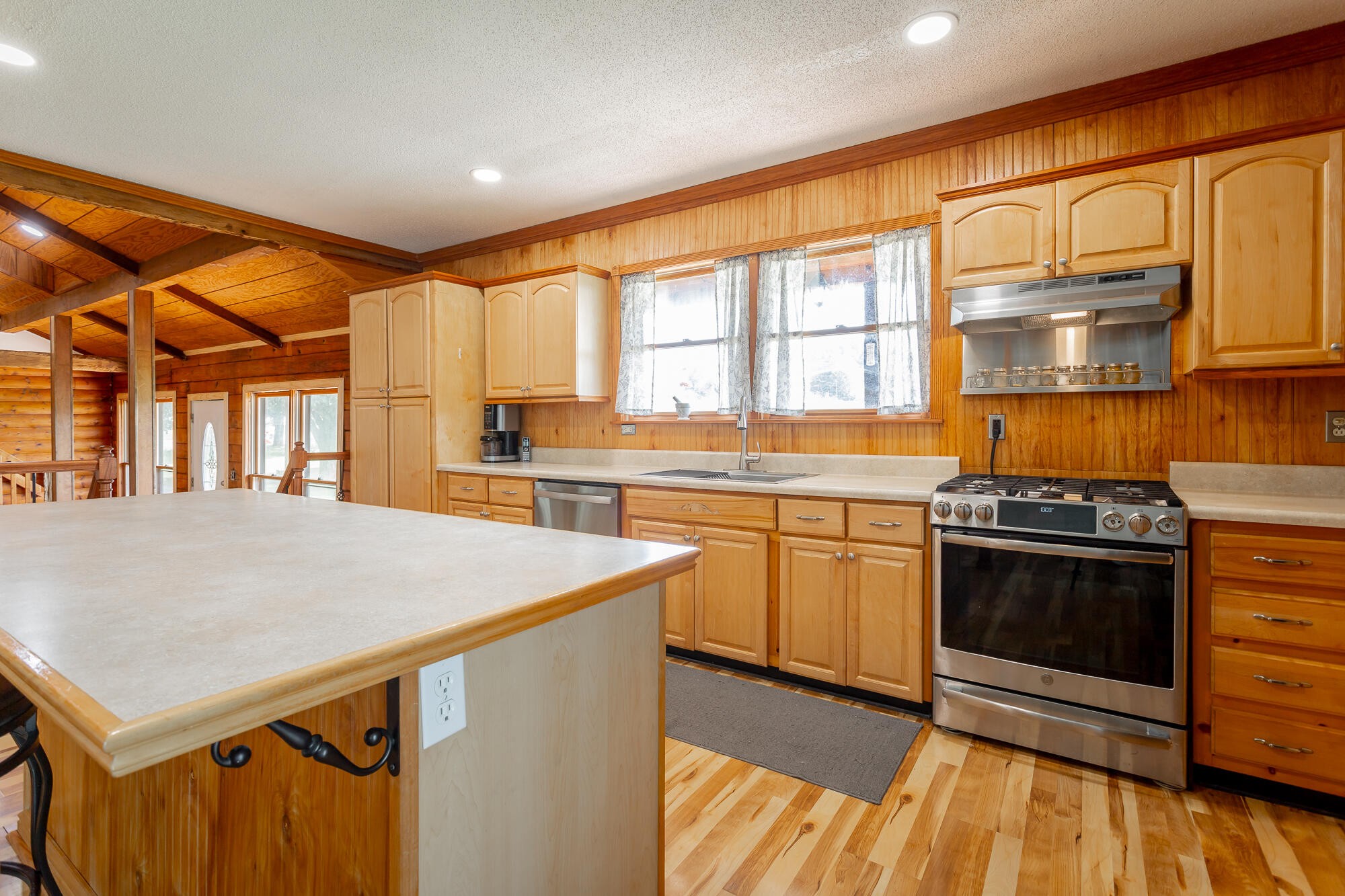2195 Myers Road Pikeville, TN 37367 - Photo 41 of 100 a kitchen with stainless steel appliances a stove top oven a sink and cabinets