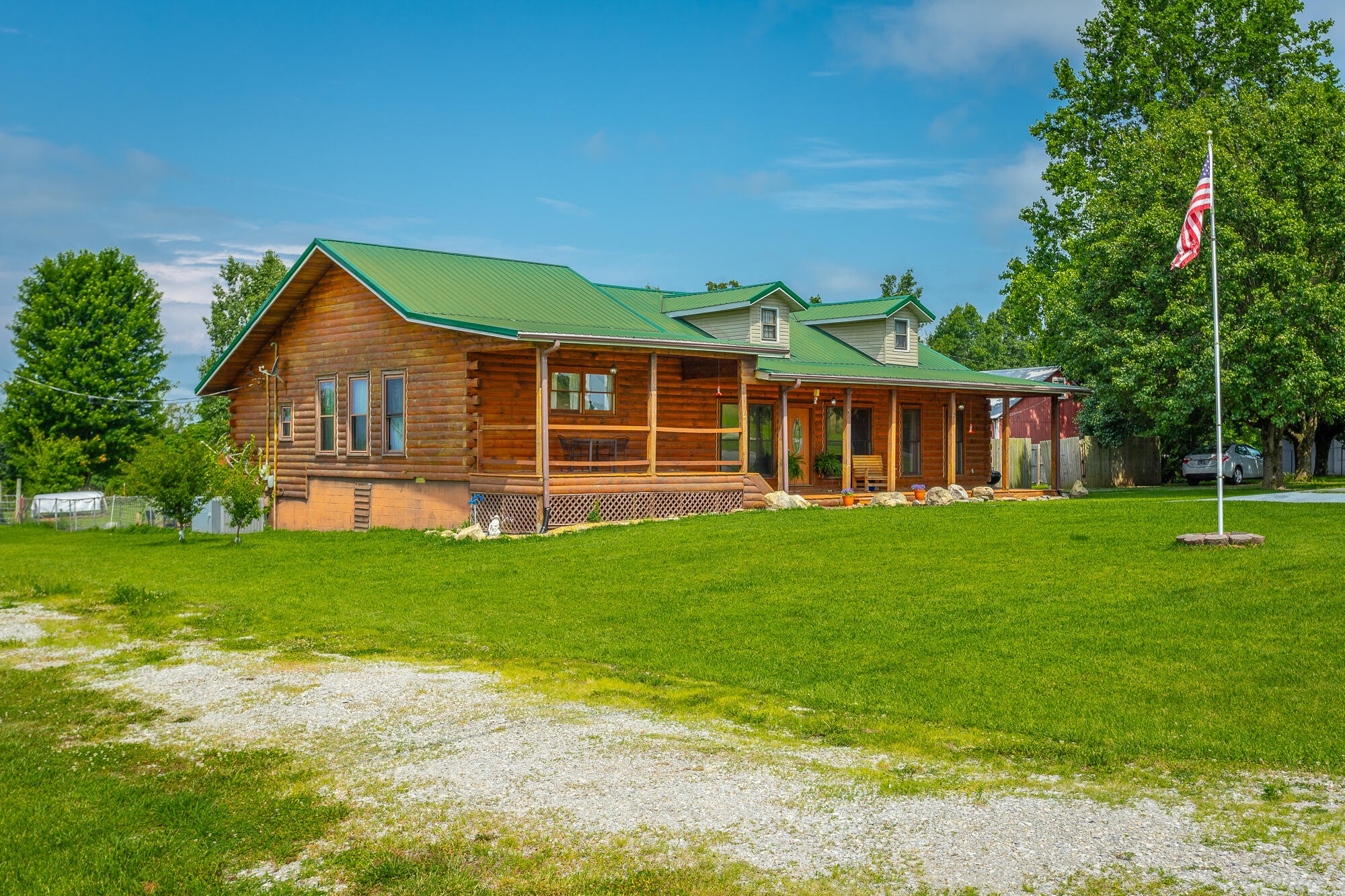 2195 Myers Road Pikeville, TN 37367 - Photo 6 of 100 a front view of a house with a garden
