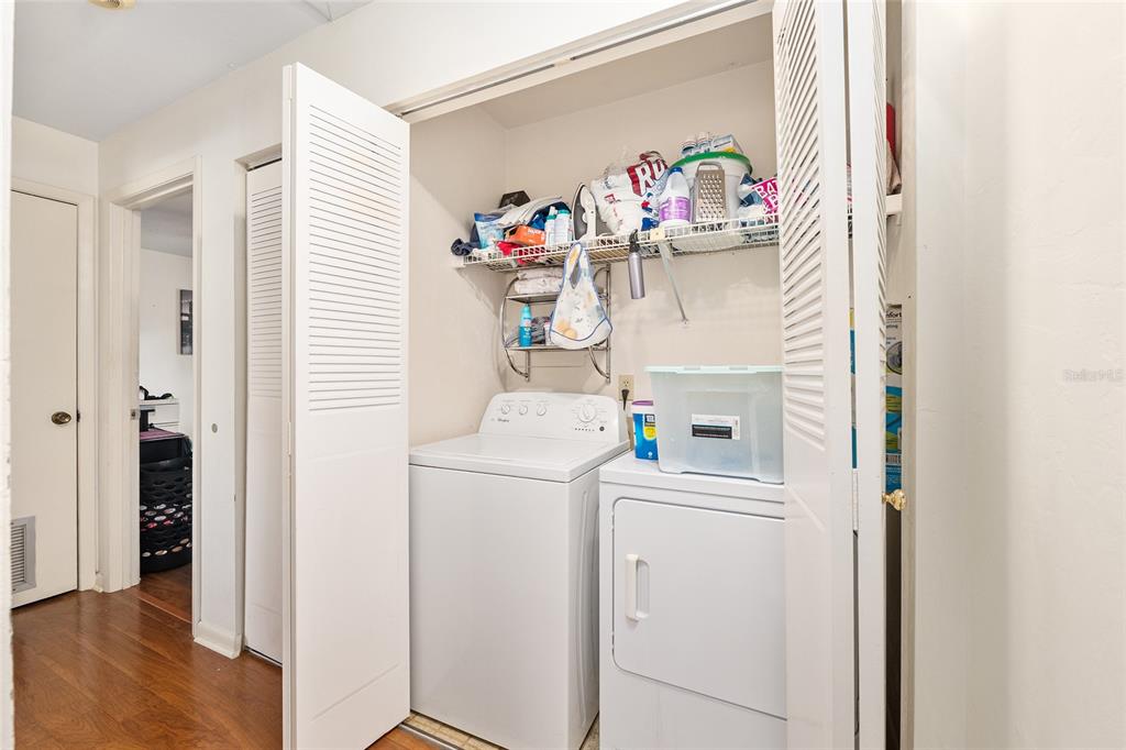 2735 Southwest 35th Place, Unit 801 Gainesville, FL 32608 - Photo 16 of 35 a view of storage and utility room with washer and dryer