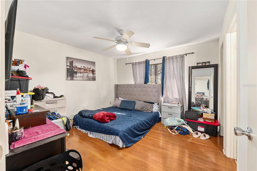 2735 Southwest 35th Place, Unit 801 Gainesville, FL 32608 - Photo 18 of 35 a living room with furniture and a mirror