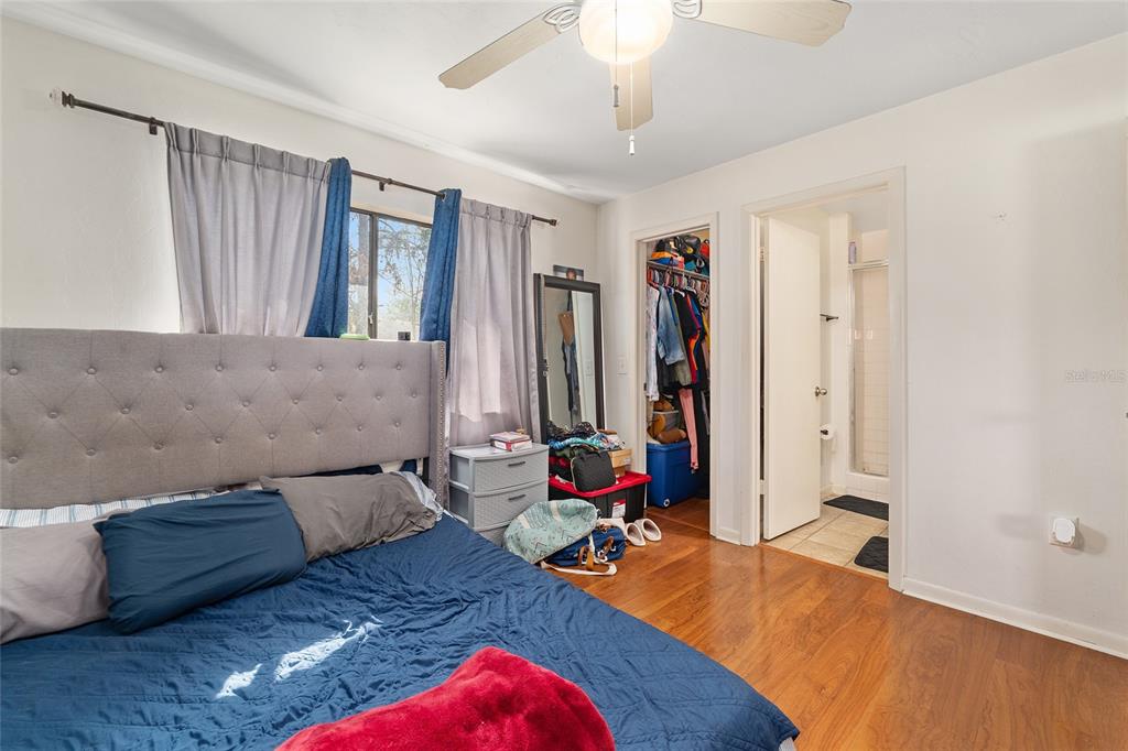 2735 Southwest 35th Place, Unit 801 Gainesville, FL 32608 - Photo 19 of 35 a living room with furniture and a flat screen tv