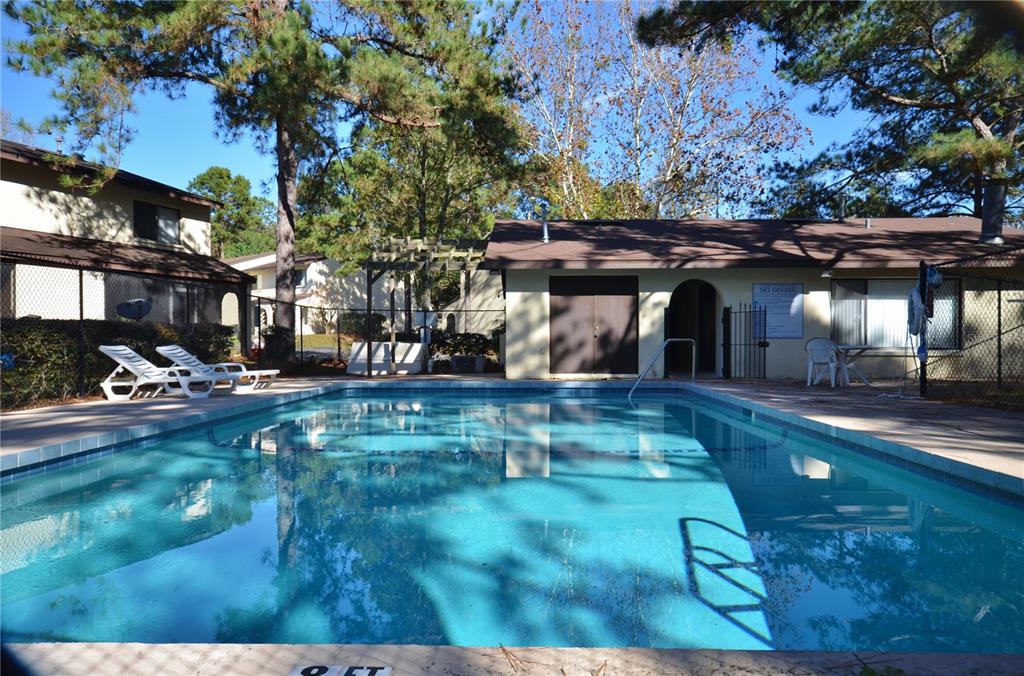 2735 Southwest 35th Place, Unit 801 Gainesville, FL 32608 - Photo 32 of 35 a view of a yard with plants