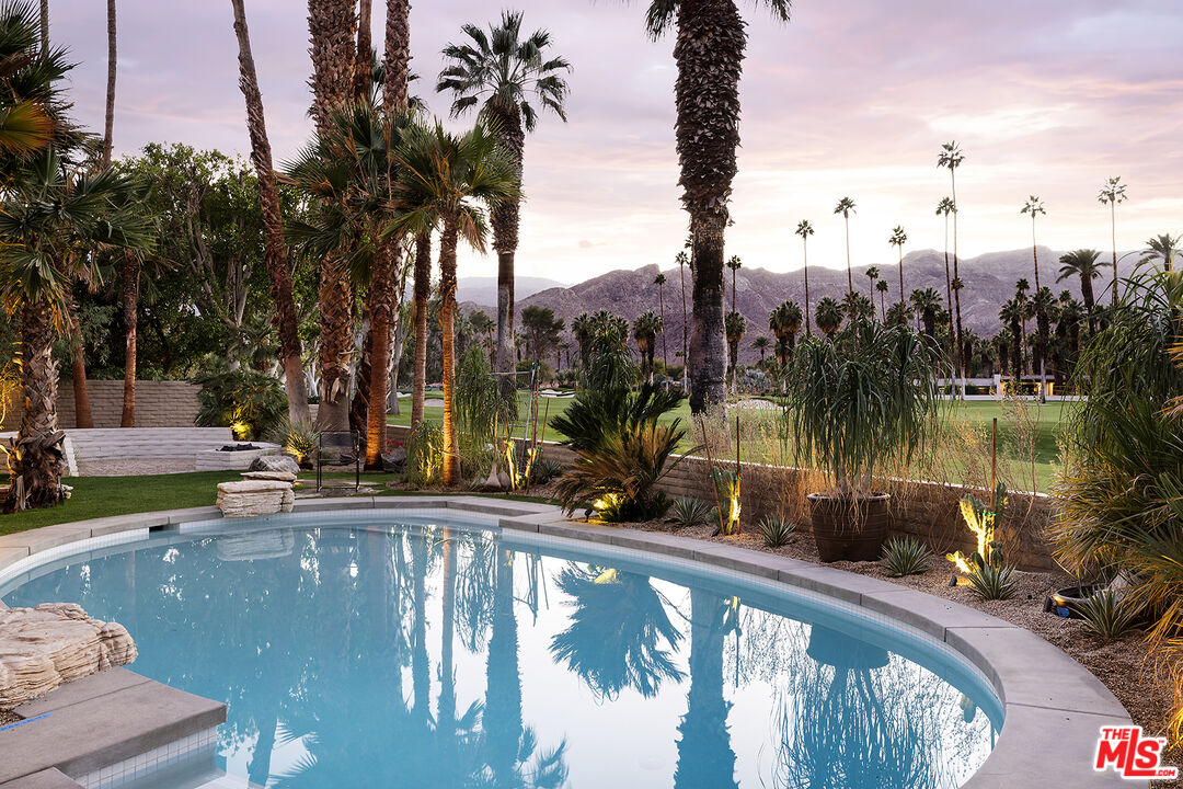 40281 Sand Dune Road Rancho Mirage, CA 92270 - Photo 29 of 39 a view of swimming pool from a lake view
