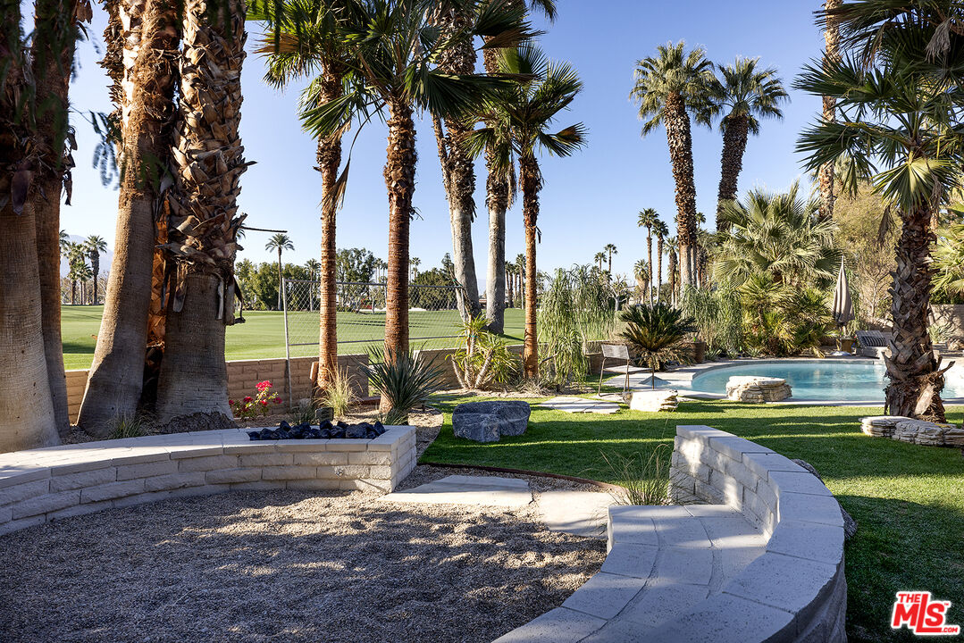 40281 Sand Dune Road Rancho Mirage, CA 92270 - Photo 30 of 39 a view of a lake with houses