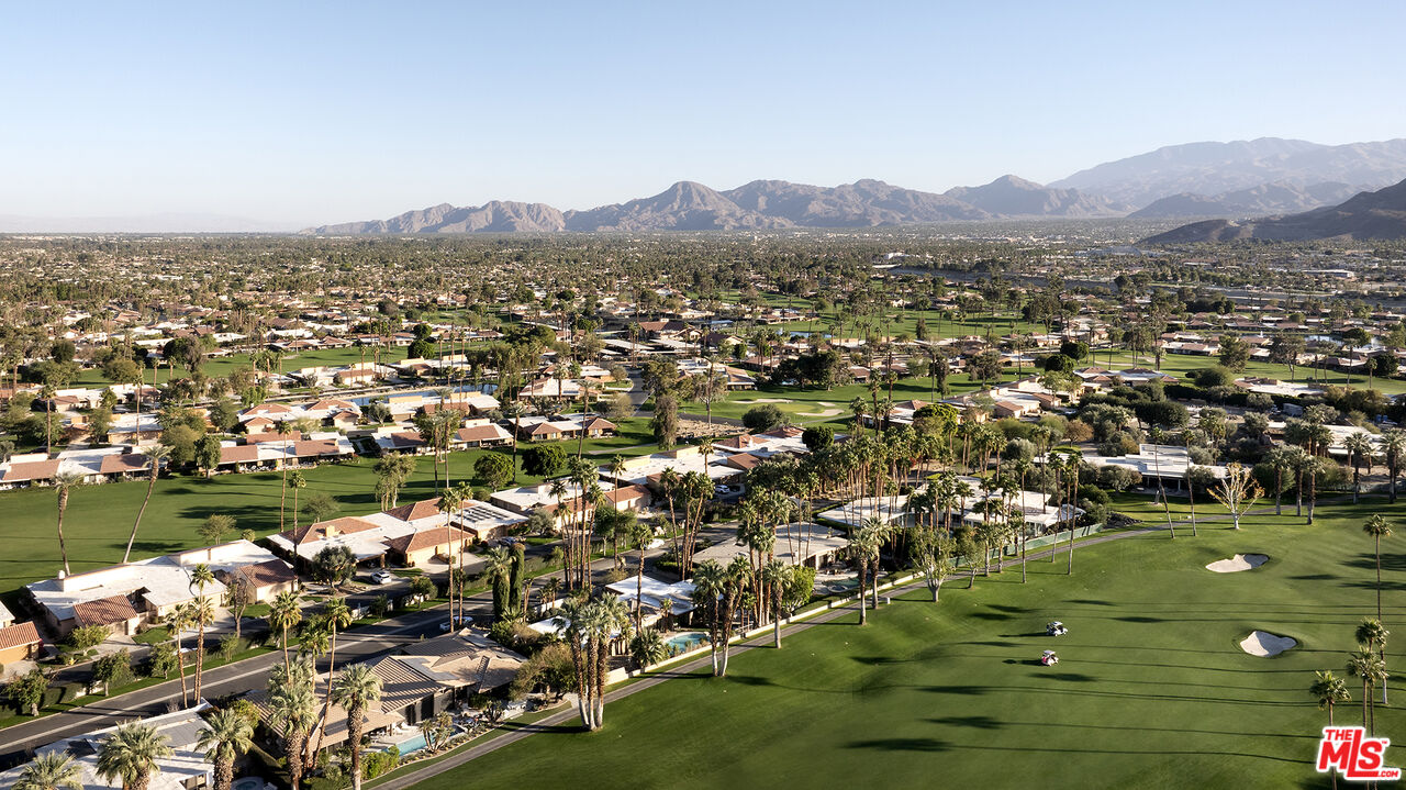 40281 Sand Dune Road Rancho Mirage, CA 92270 - Photo 36 of 39 an aerial view of residential houses with outdoor space and trees