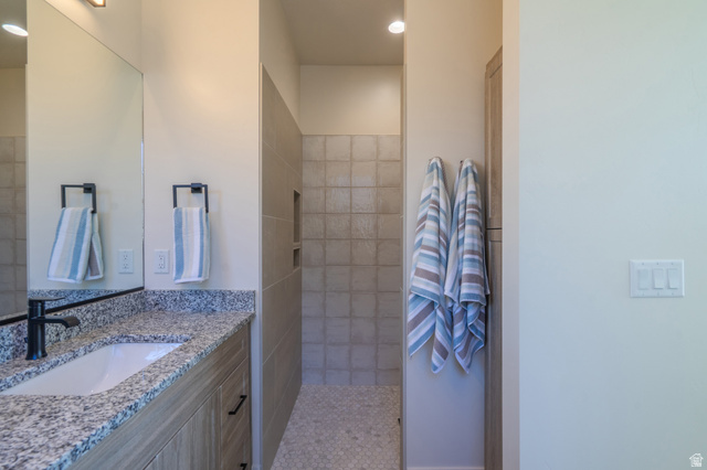 2972 West 570 North Hurricane, UT 84737 - Photo 54 of 104 Full bath featuring vanity and a walk in shower