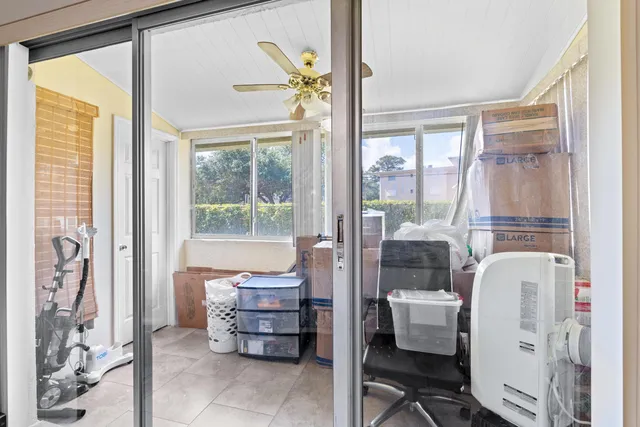 a room with furniture and a window