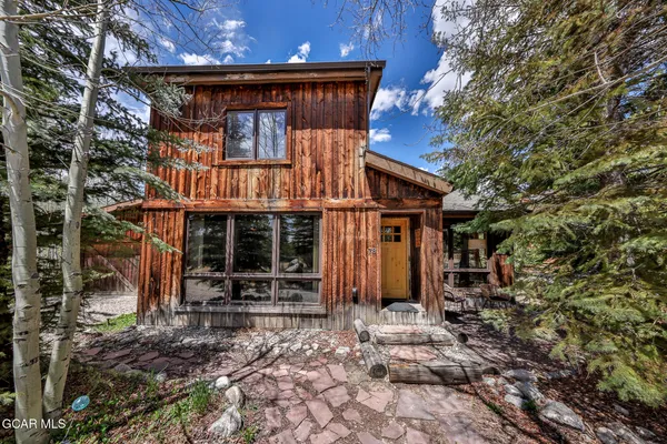 a view of a house with a porch