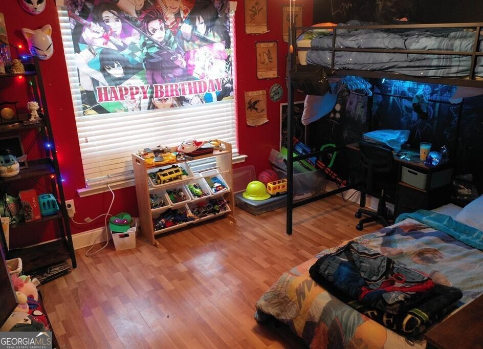 201 Boulder Creek Road Kathleen, GA 31047 - Photo 13 of 21 a room with lots of different colored cloths