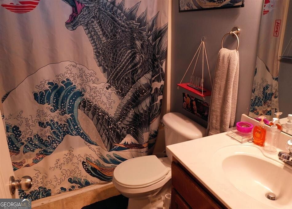 201 Boulder Creek Road Kathleen, GA 31047 - Photo 15 of 21 a bathroom with a toilet sink and mirror