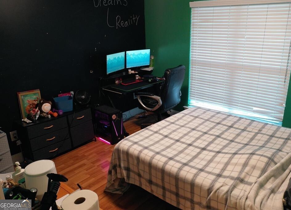 201 Boulder Creek Road Kathleen, GA 31047 - Photo 16 of 21 a bedroom with a bed and a dresser