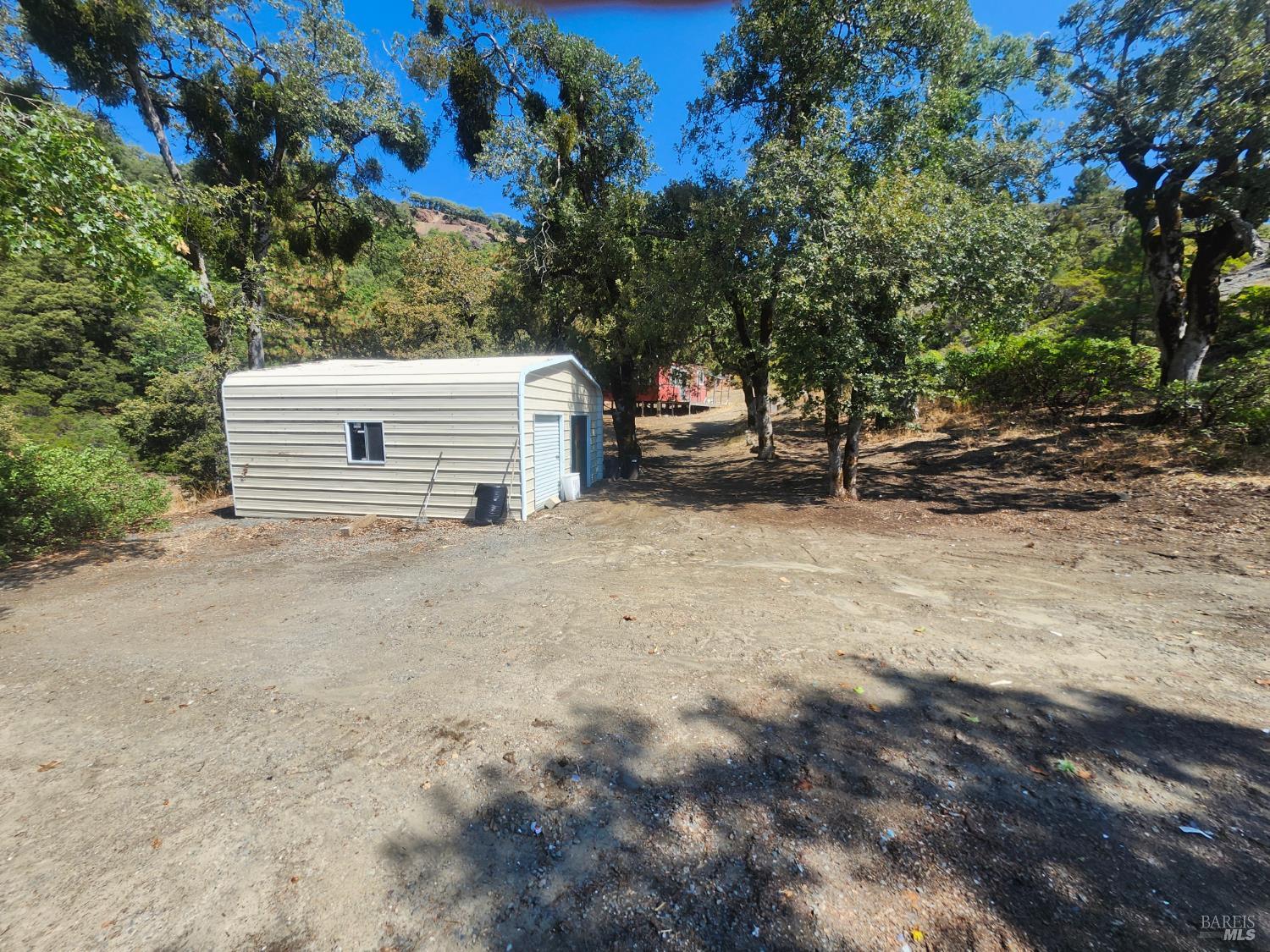5635 Iron Peak Road Laytonville, CA 95454 - Photo 12 of 15 a view of a house with a tree