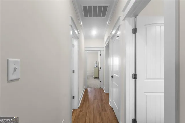 a bedroom with a bed and a tv