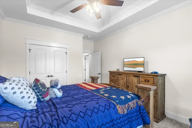 a kitchen with a refrigerator and a stove top oven