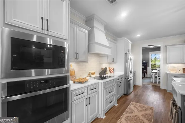 a bathroom with a double vanity sink mirror and double