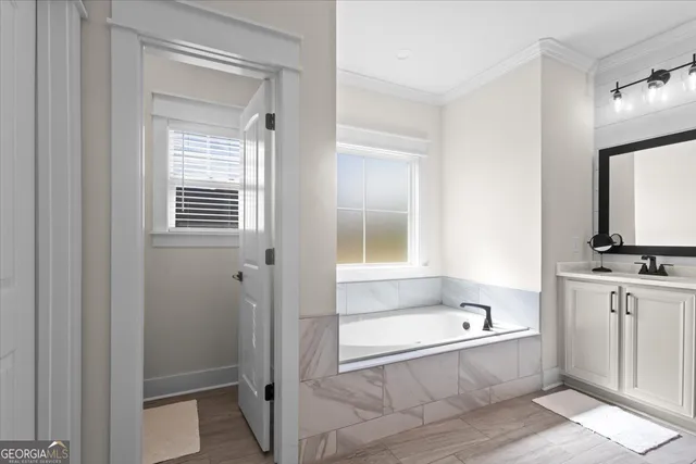 an aerial view of a house with a swimming pool