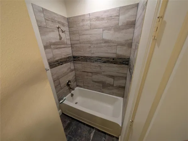a bathroom with a bathtub