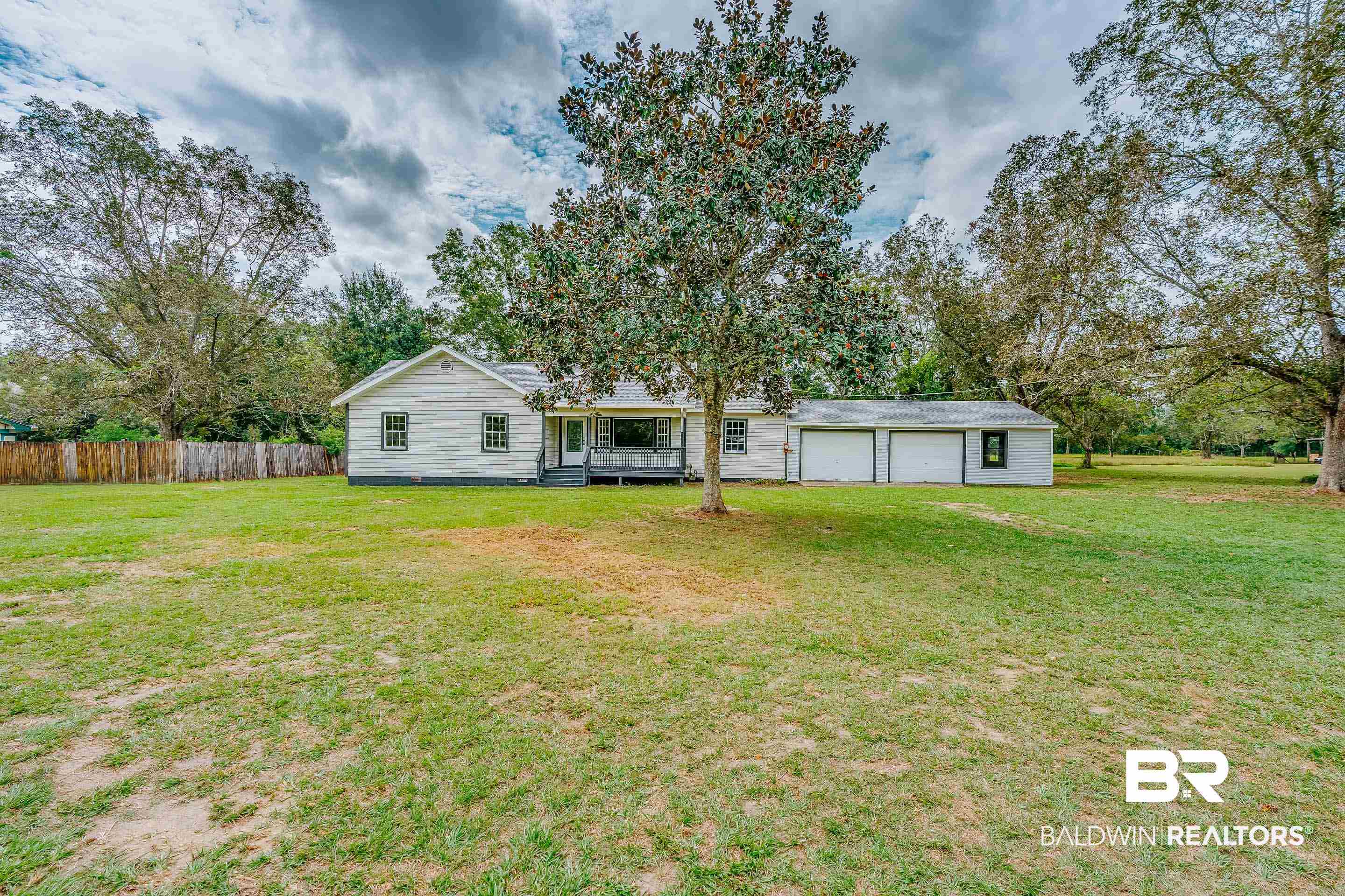 8001 16th Street Irvington, AL 36544 - Photo 34 of 35 Back of house with a deck