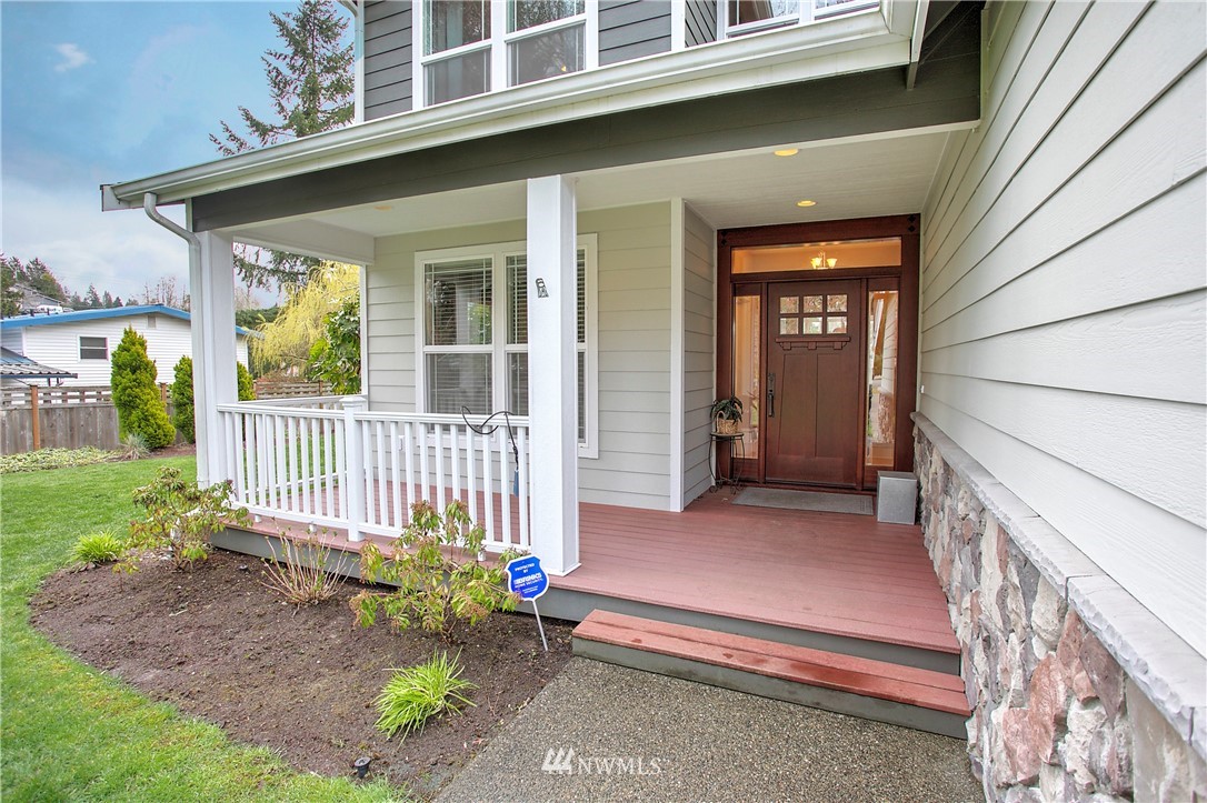 5615 Northeast 10th Street Renton, WA 98059 - Photo 2 of 35 a view of a house with a small yard and wooden floor and fence