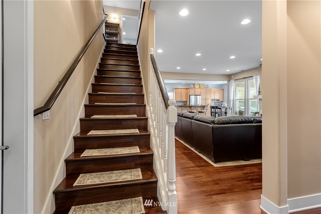 5615 Northeast 10th Street Renton, WA 98059 - Photo 19 of 35 a view of entryway and hall with wooden floor