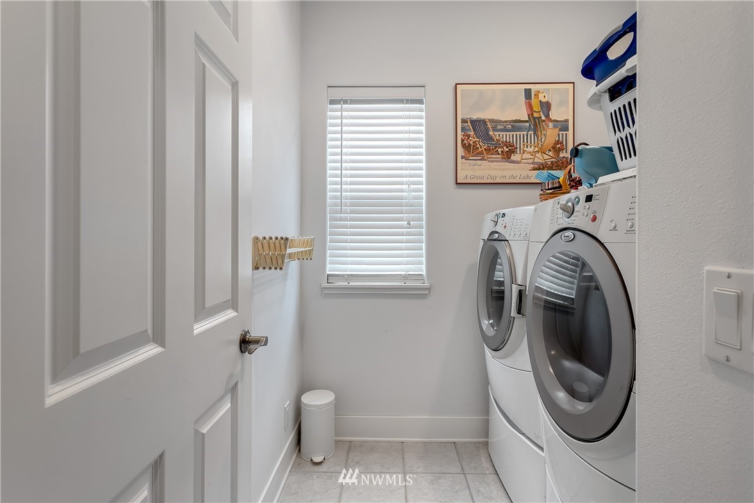 5615 Northeast 10th Street Renton, WA 98059 - Photo 25 of 35 a utility room with dryer and washer