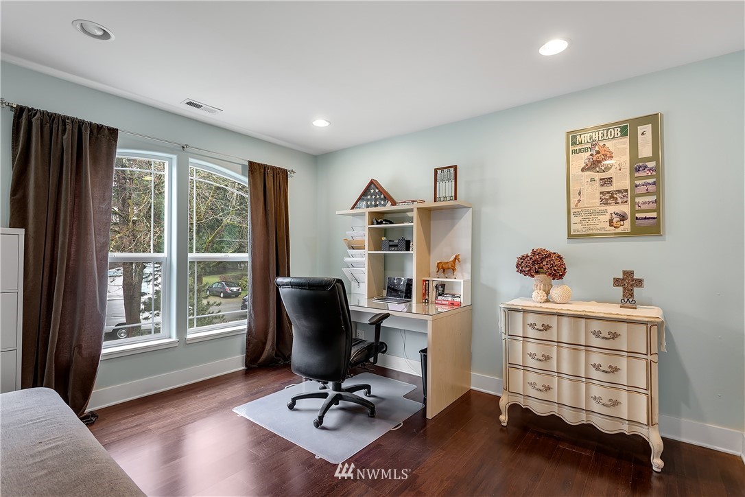 5615 Northeast 10th Street Renton, WA 98059 - Photo 26 of 35 a view of a workspace with furniture and a window