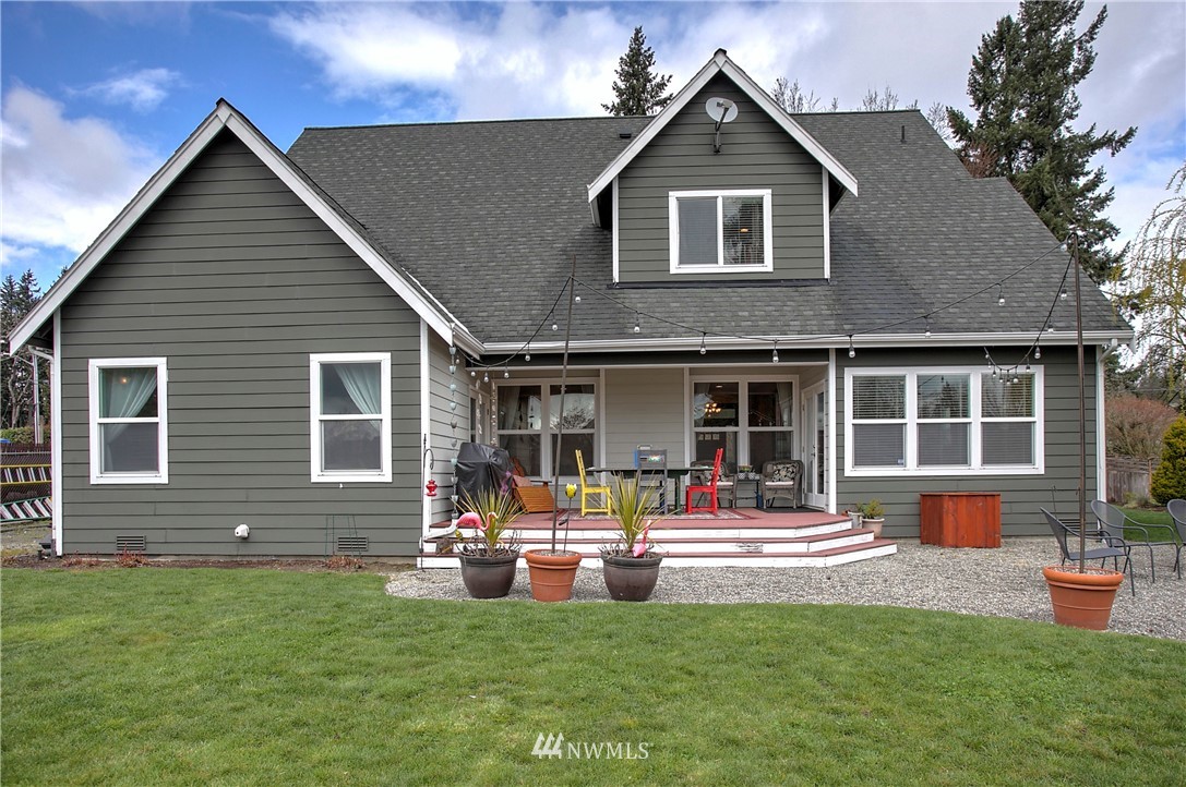5615 Northeast 10th Street Renton, WA 98059 - Photo 32 of 35 a front view of house with yard and outdoor seating