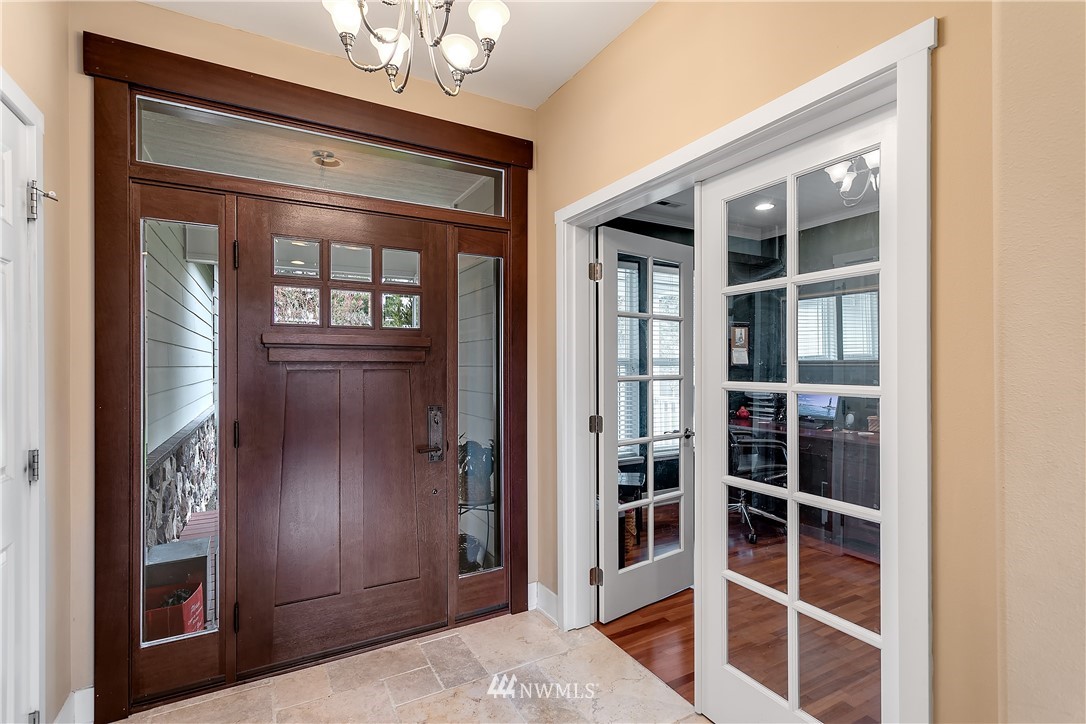 5615 Northeast 10th Street Renton, WA 98059 - Photo 6 of 35 a view of front door with hallway