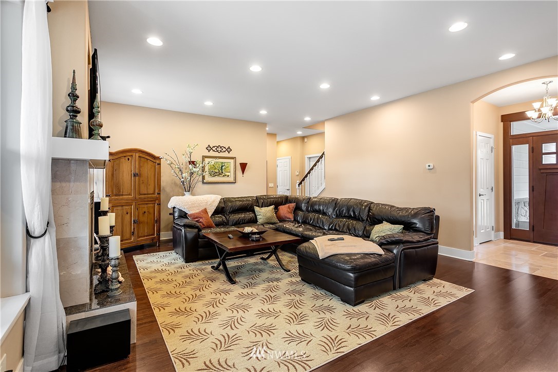 5615 Northeast 10th Street Renton, WA 98059 - Photo 7 of 35 a living room with furniture and wooden floor