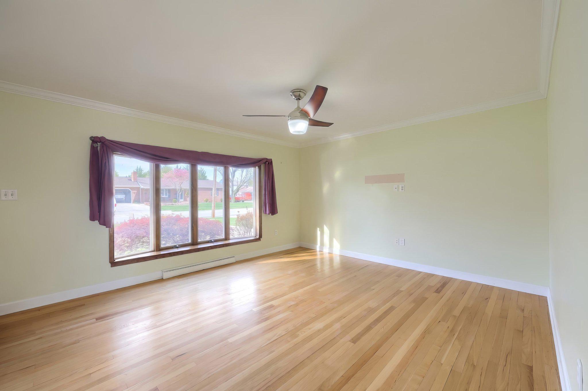 410 Diller Road Hanover, PA 17331 - Photo 15 of 41 an empty room with wooden floor and windows