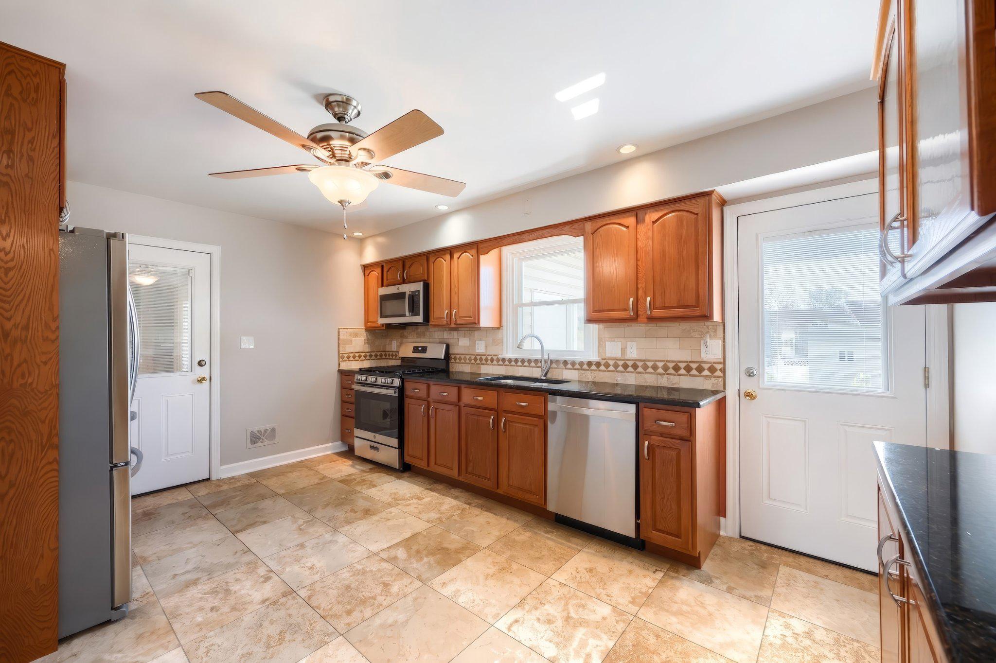 410 Diller Road Hanover, PA 17331 - Photo 18 of 41 a large kitchen with stainless steel appliances granite countertop a refrigerator and a stove top oven