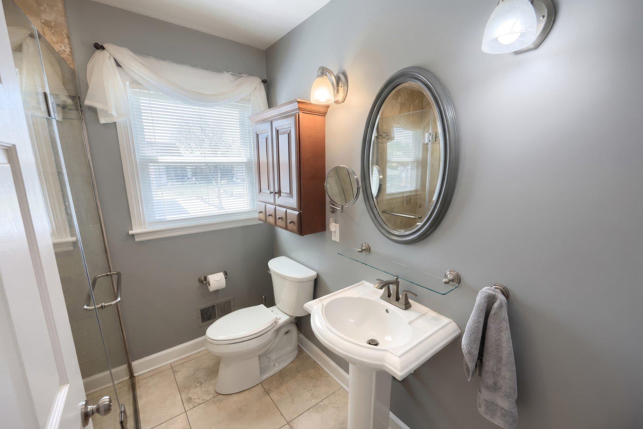 410 Diller Road Hanover, PA 17331 - Photo 21 of 41 a bathroom with a toilet a sink and a mirror