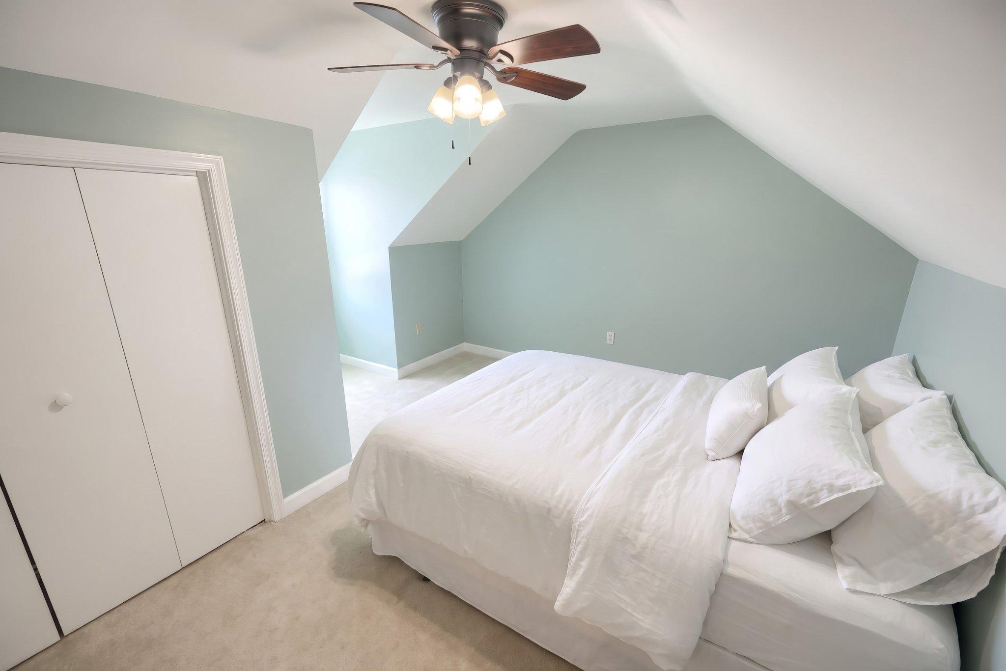 410 Diller Road Hanover, PA 17331 - Photo 28 of 41 a bedroom with a white bed and a chandelier