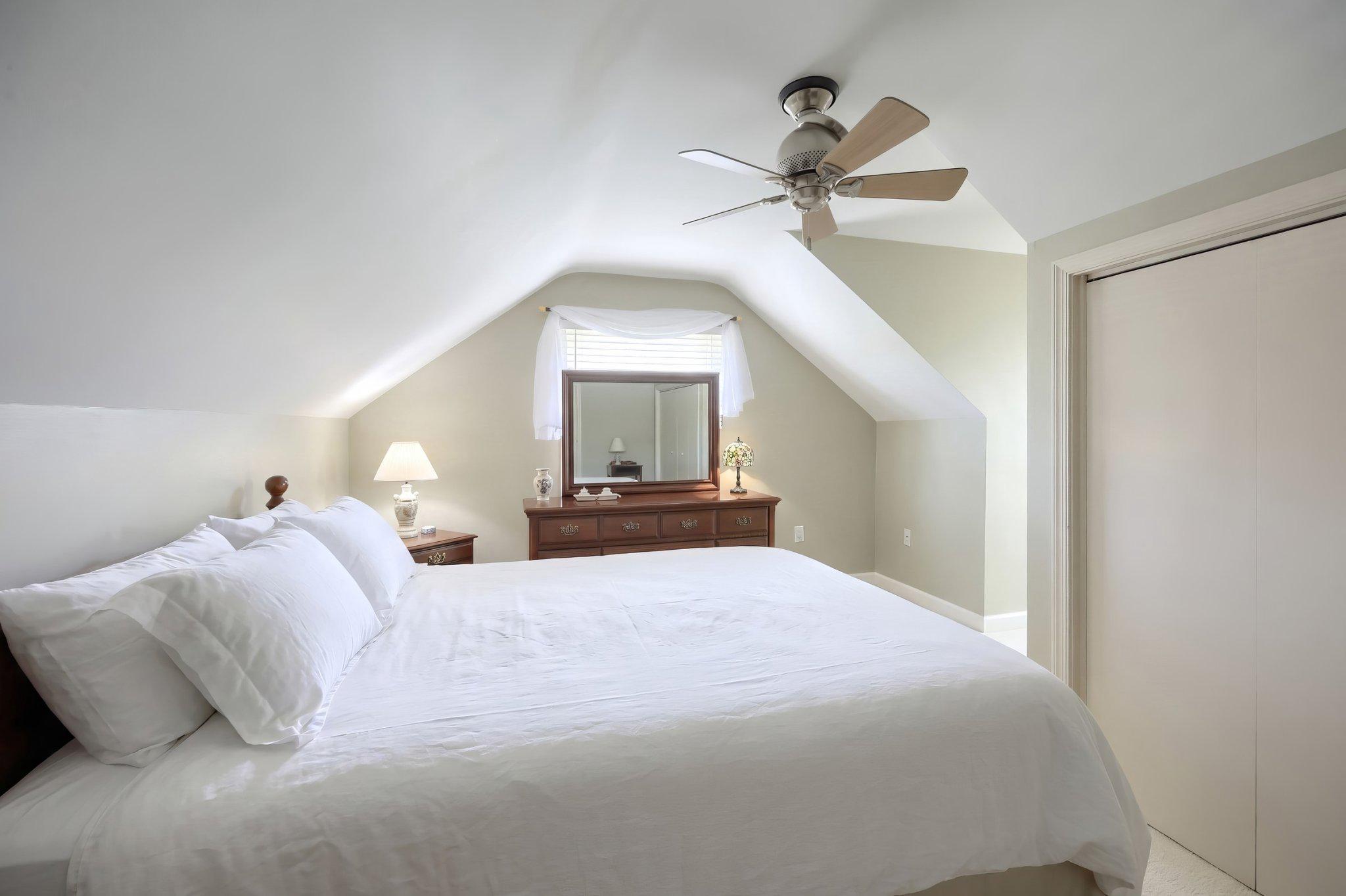 410 Diller Road Hanover, PA 17331 - Photo 29 of 41 a bedroom with a bed and a chandelier