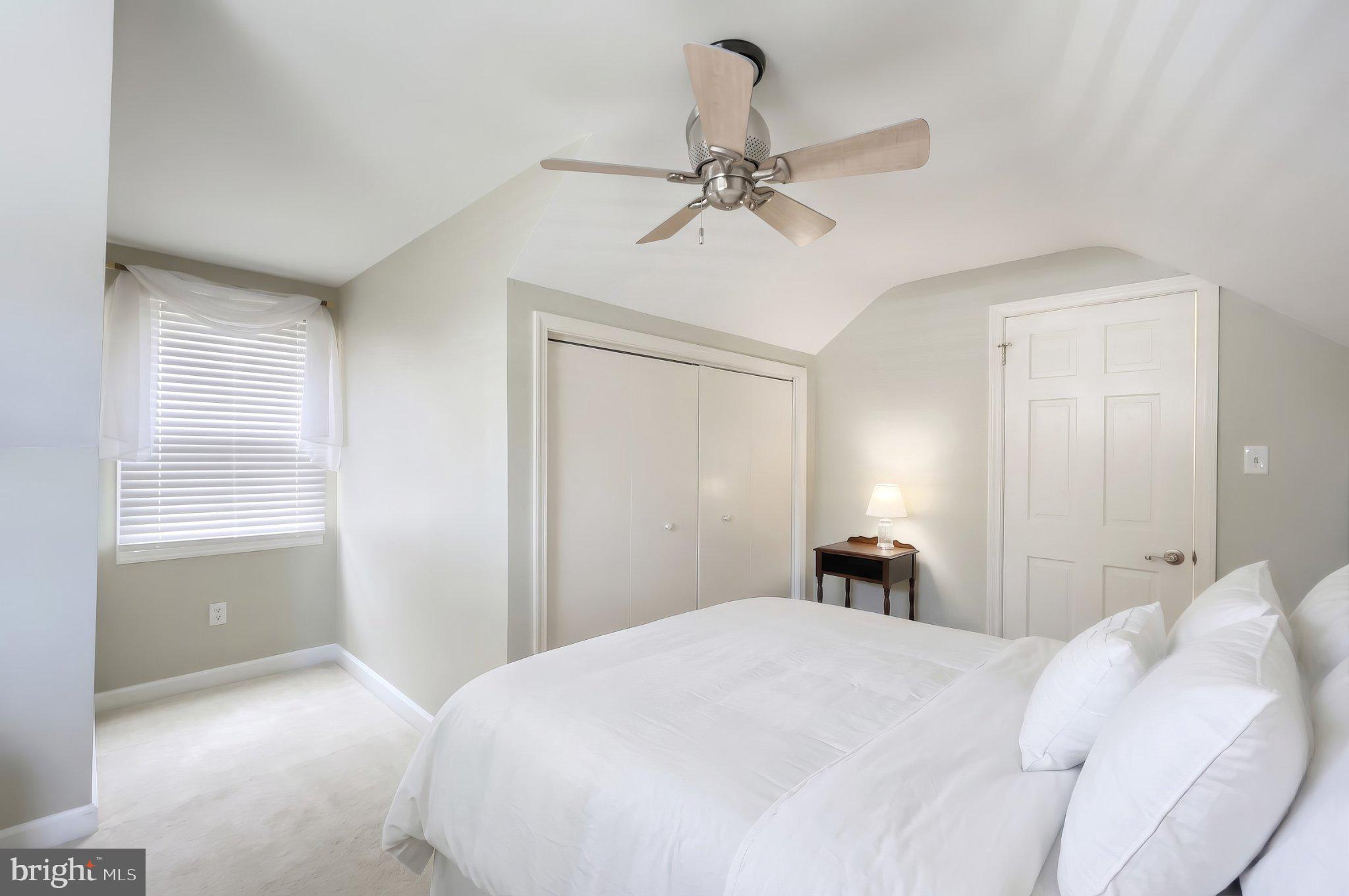 410 Diller Road Hanover, PA 17331 - Photo 30 of 41 a bedroom with a bed and a chandelier