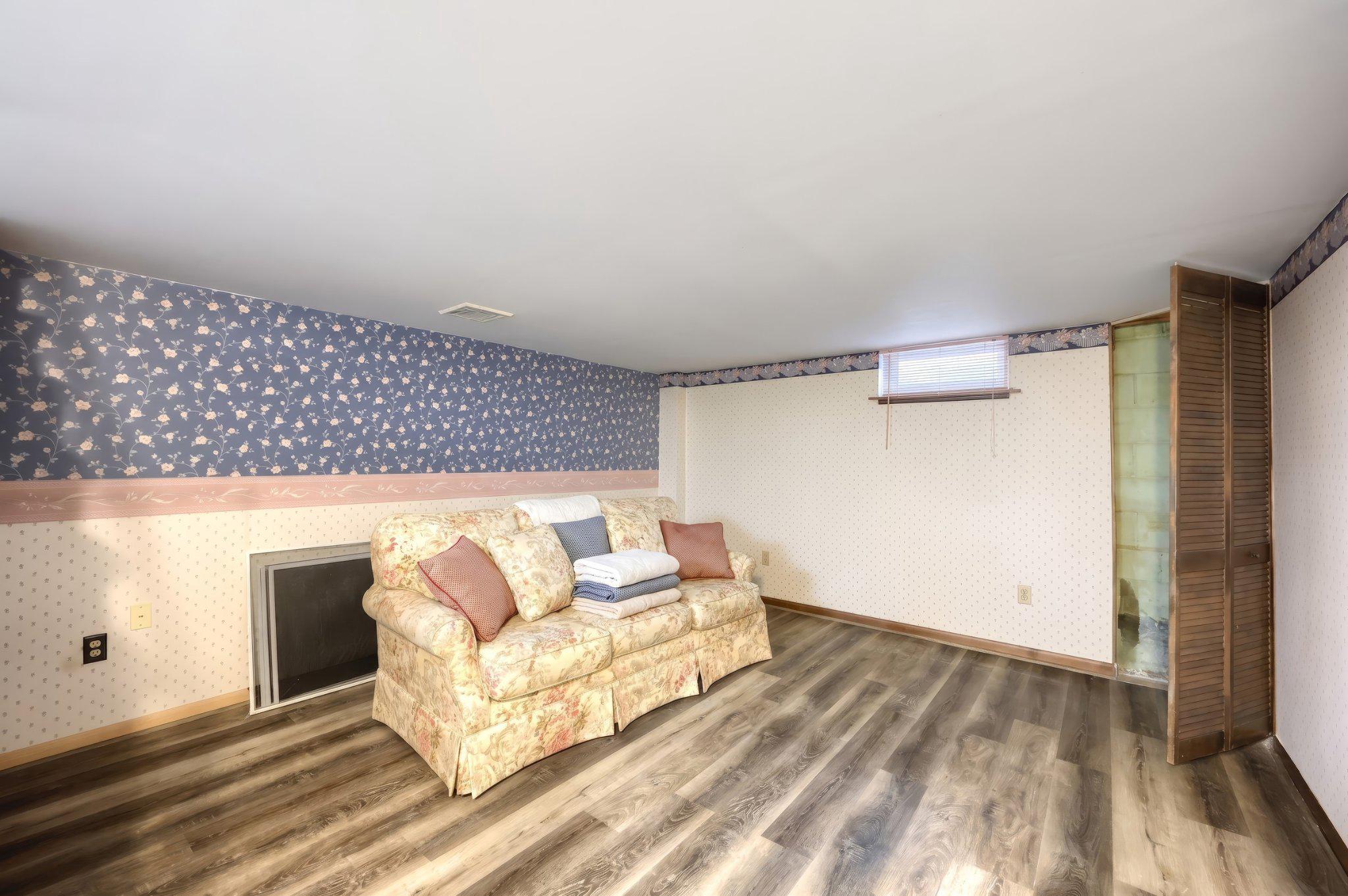 410 Diller Road Hanover, PA 17331 - Photo 35 of 41 a living room with a couch and a rug