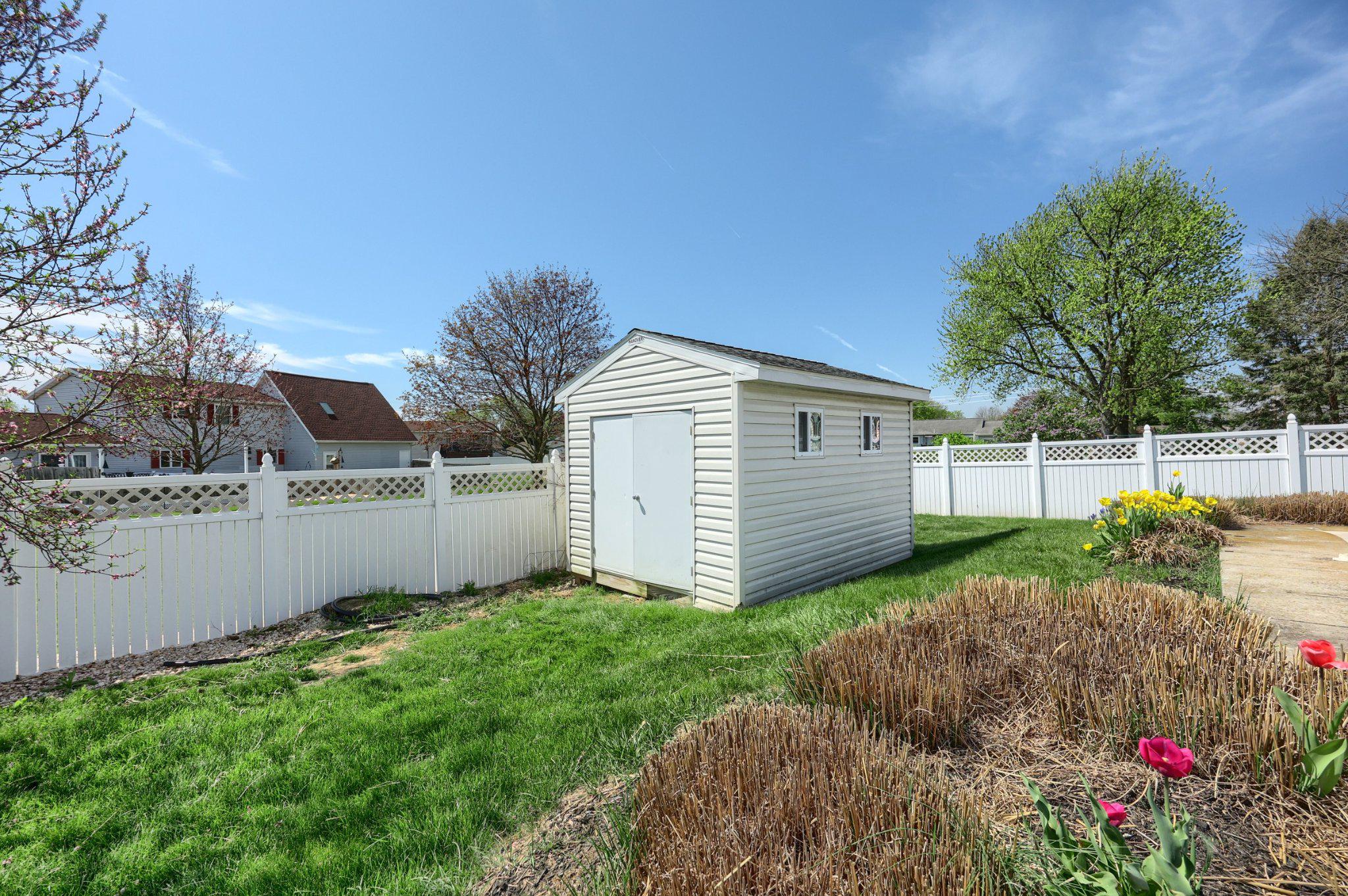 410 Diller Road Hanover, PA 17331 - Photo 9 of 41 a view of a backyard with potted plants and large tree