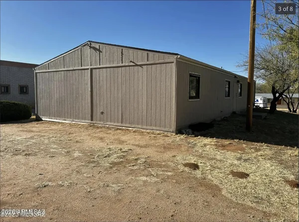 a view of backyard of house