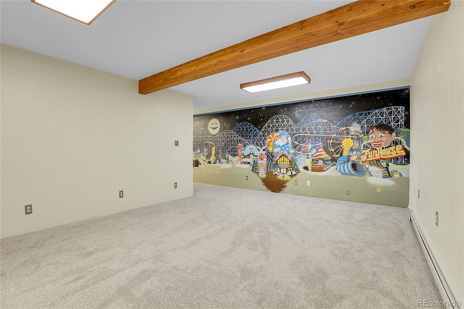 11333 Conifer Mountain Road Conifer, CO 80433 - Photo 43 of 50 a view of a garage with lots of stuff