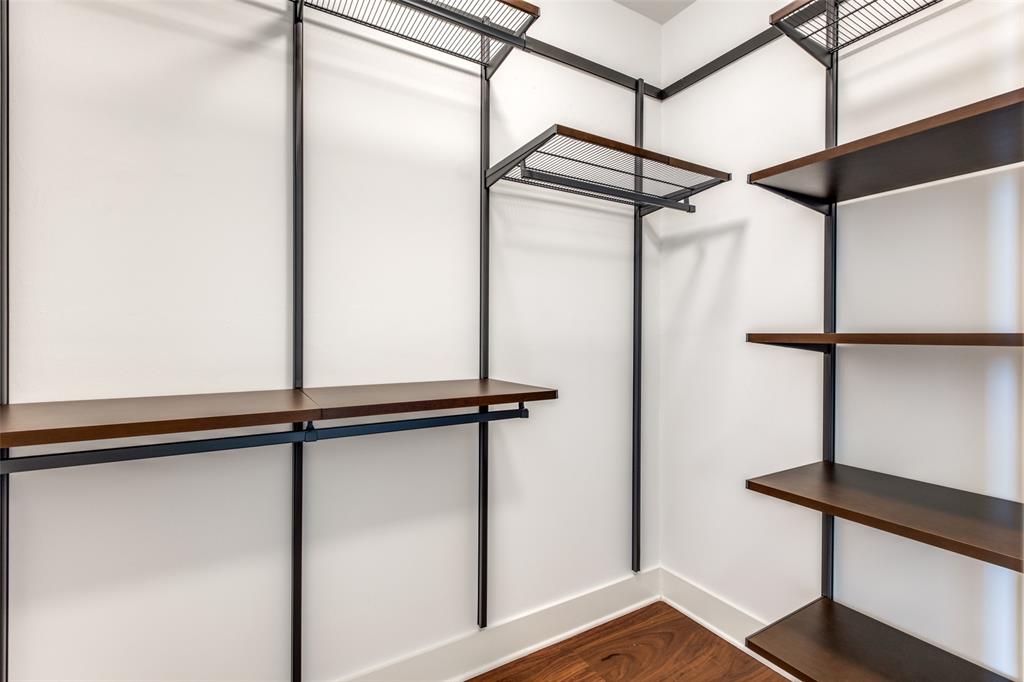 3611 Congress Avenue, Unit 2103 Dallas, TX 75219 - Photo 17 of 25 a view of a room with racks on the wall