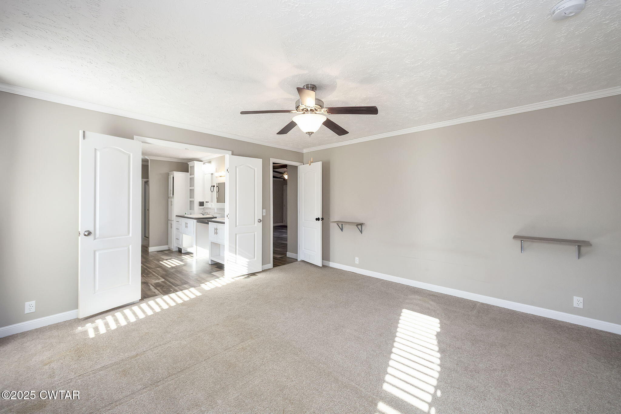 527 John Brown Road Beech Bluff, TN 38313 - Photo 14 of 28 a view of a livingroom with a chandelier fan