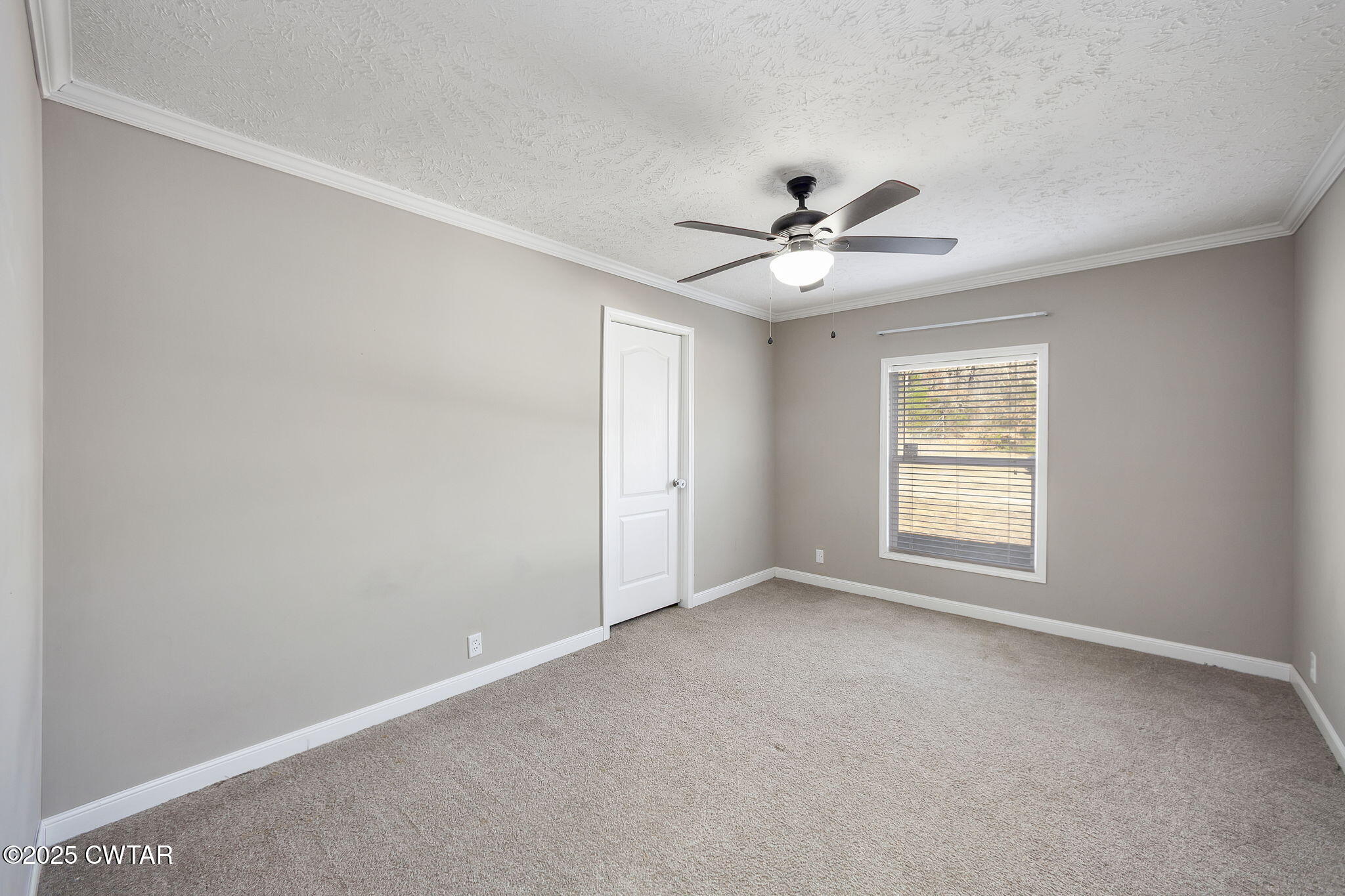 527 John Brown Road Beech Bluff, TN 38313 - Photo 18 of 28 a view of an empty room with a window