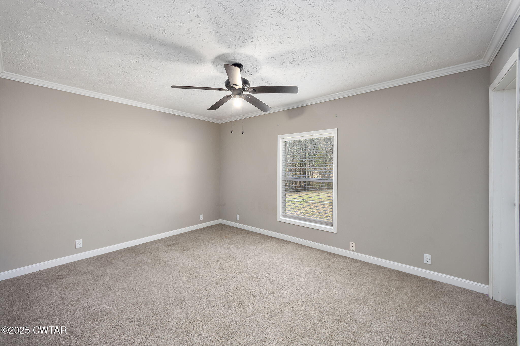 527 John Brown Road Beech Bluff, TN 38313 - Photo 20 of 28 a view of an empty room with a window