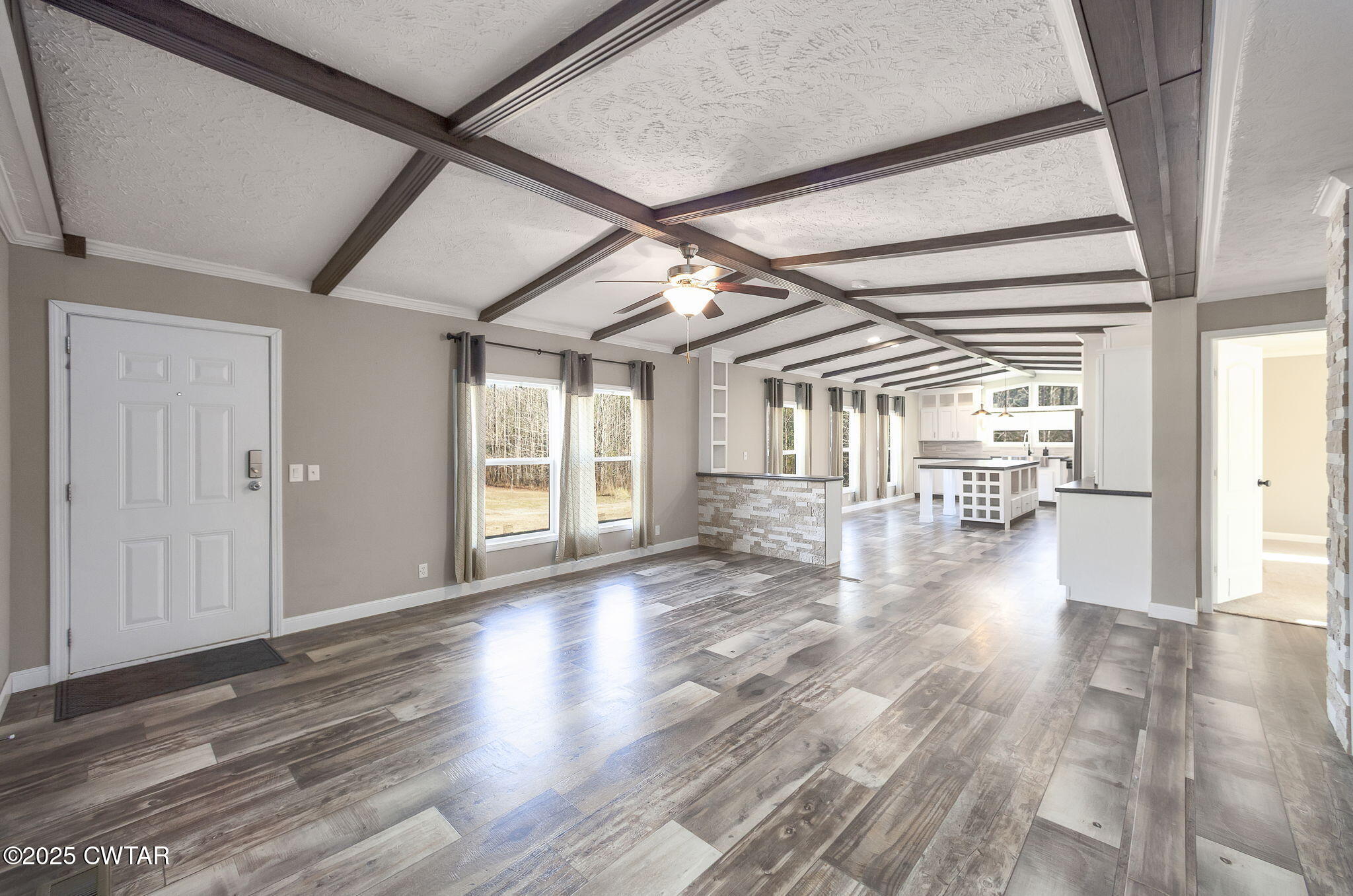 527 John Brown Road Beech Bluff, TN 38313 - Photo 6 of 28 a view interior of the house and livingroom with wooden floor