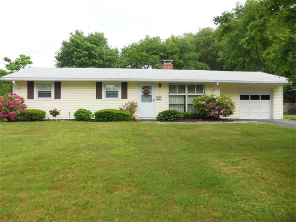 8 Leatherchip Road Holbrook, MA 02343 - Photo 1 of 18 a front view of a house with garden