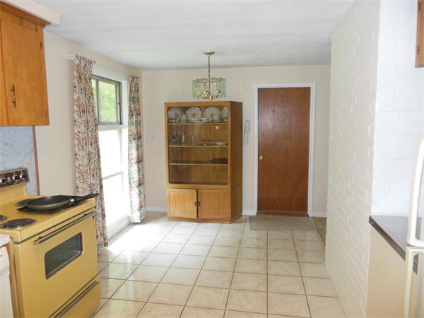 8 Leatherchip Road Holbrook, MA 02343 - Photo 4 of 18 a view of a kitchen with a stove cabinets and a kitchen
