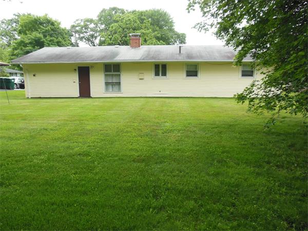 8 Leatherchip Road Holbrook, MA 02343 - Photo 8 of 18 a house view with a garden space
